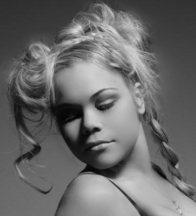 Female model photo shoot of Ryann Hair and Makeup