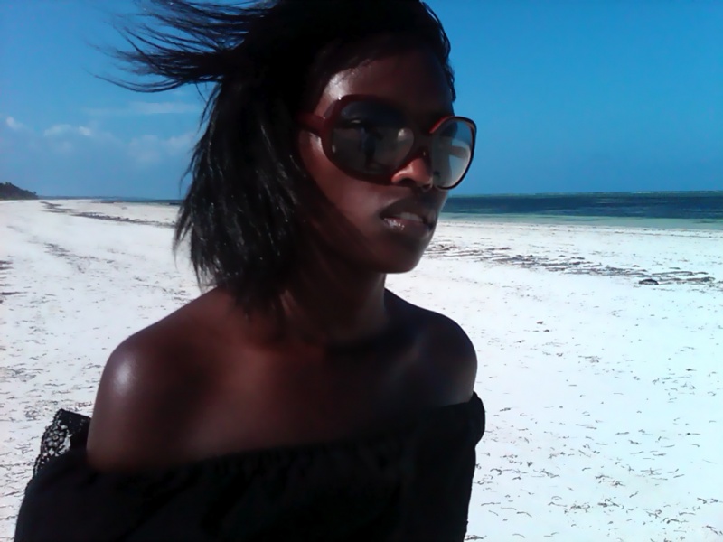 Female model photo shoot of CIRU Maina in Zanzibar