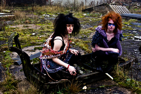 Female model photo shoot of Helen Lambert and Bea Sinful in Another Burnt out building, clothing designed by Richard Price knitwear