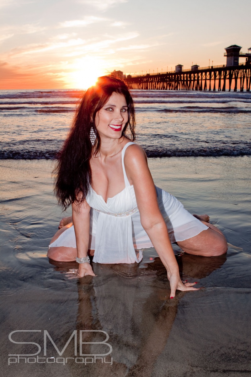 Female model photo shoot of Tammie Starr by smb Photography in Oceanside Beach Shoot