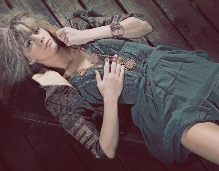 Female model photo shoot of Oblivion Clothing in rocket box at zona rosa