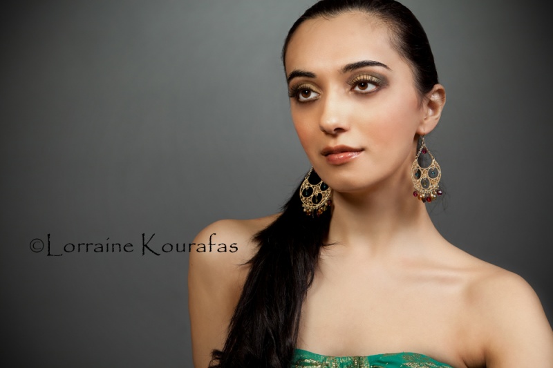 Female model photo shoot of Kourafas Photography and SimSet