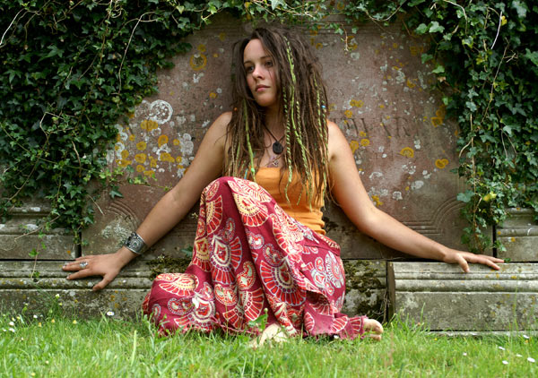 Female model photo shoot of Olivia Lynch I in Wisborough Green church yard