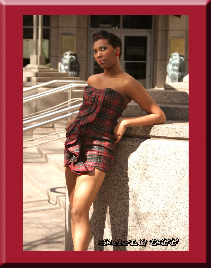Female model photo shoot of Simply Tiff by East Coast Terry in Downtown Charlotte, clothing designed by Simply Tiff