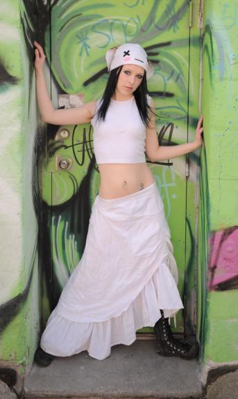 Female model photo shoot of Lavender Violette by Drew Hoshkiw in .Graffitied Back Alley.