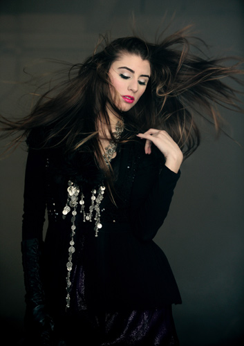 Female model photo shoot of Amber Makeup Design