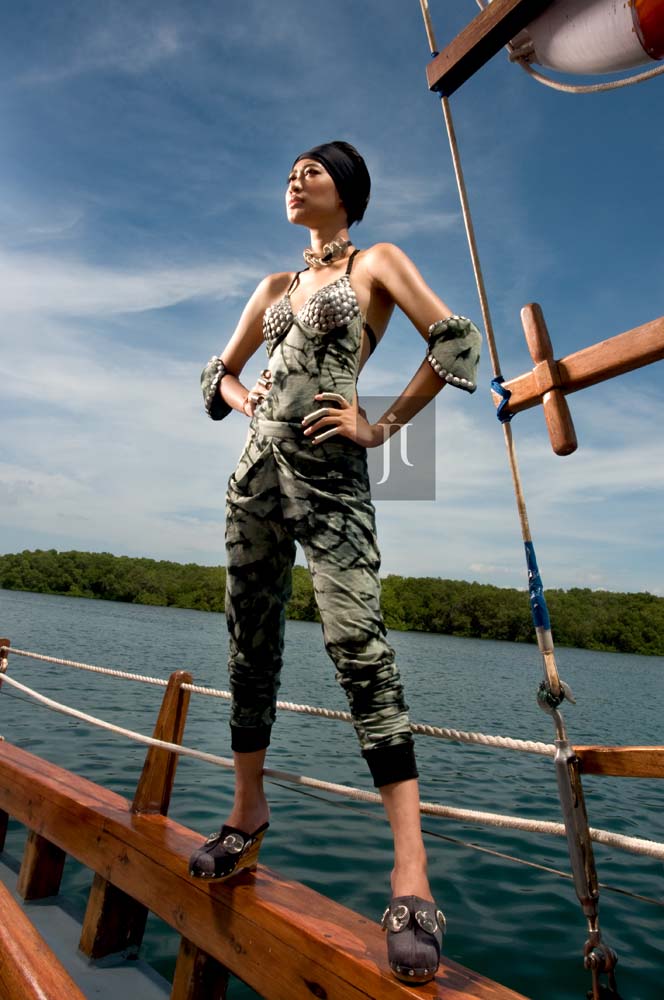 Male model photo shoot of aji mahareshi in boat-serangan