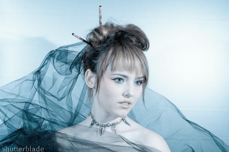 Female model photo shoot of shutterblade in Baci Salon
