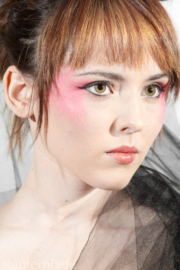 Female model photo shoot of shutterblade in Baci Salon
