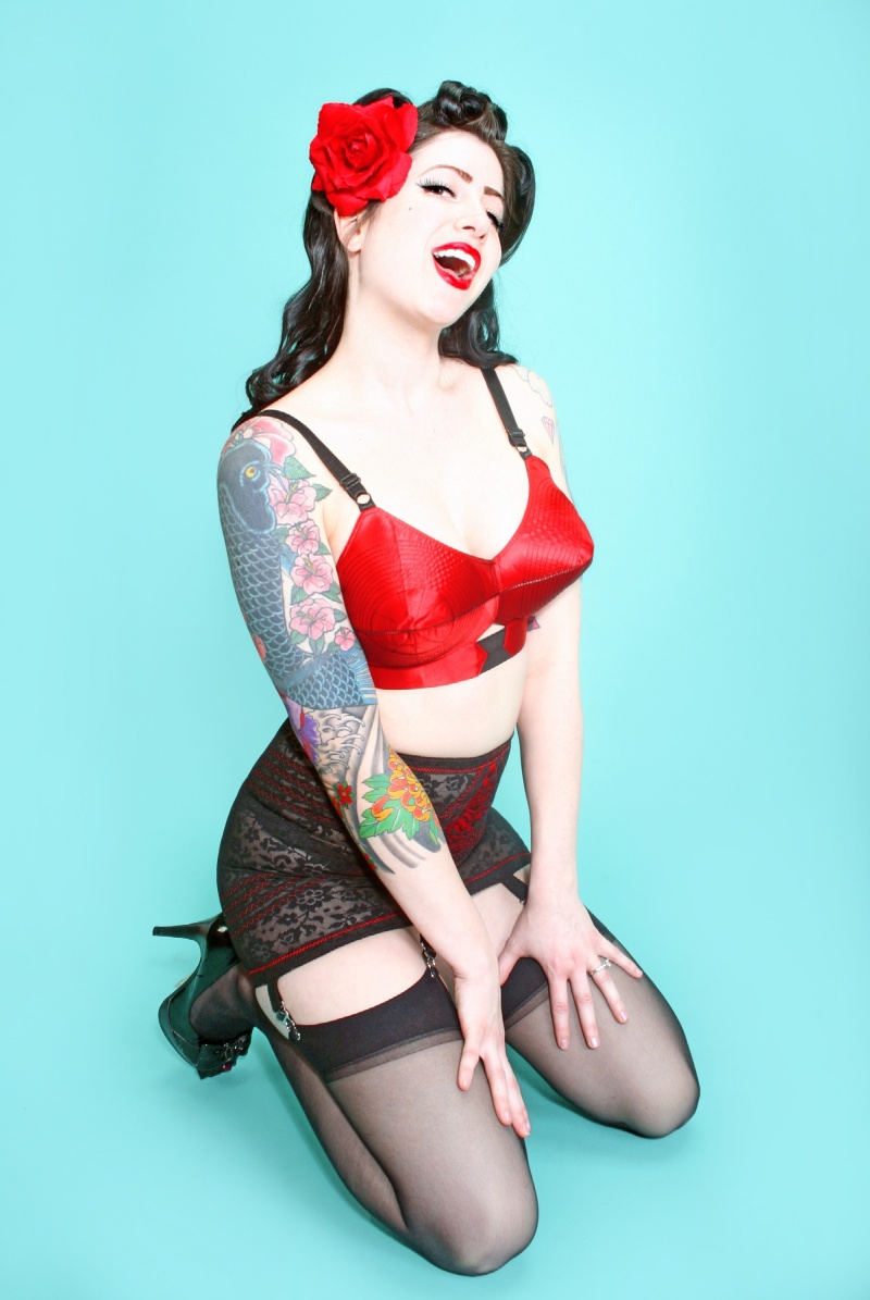 Female model photo shoot of Chesty Evans by Vixen PinUp Photography