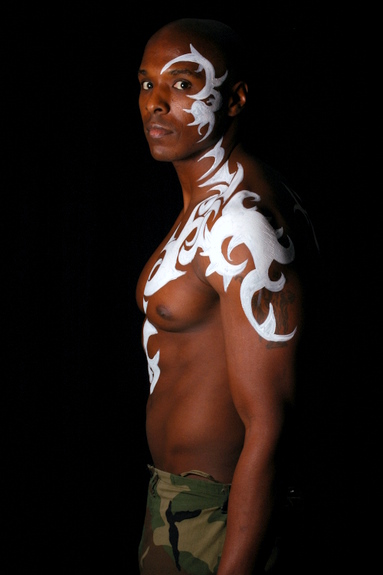Male model photo shoot of JJ LeFlouria by Tony Aldridge Photograp, body painted by Michelle theBodypainter