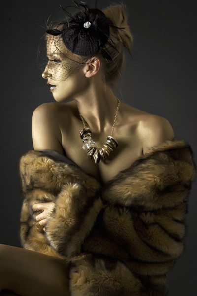 Female model photo shoot of Pika make up - Molonato