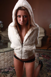 Female model photo shoot of Marley Reanee McGowan in friends house used as studio