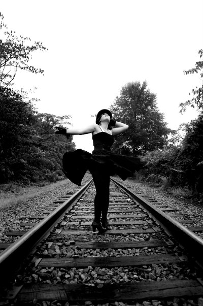 Female model photo shoot of Emma Hill Photography and MinnieAmelia in Central ave. train tracks
