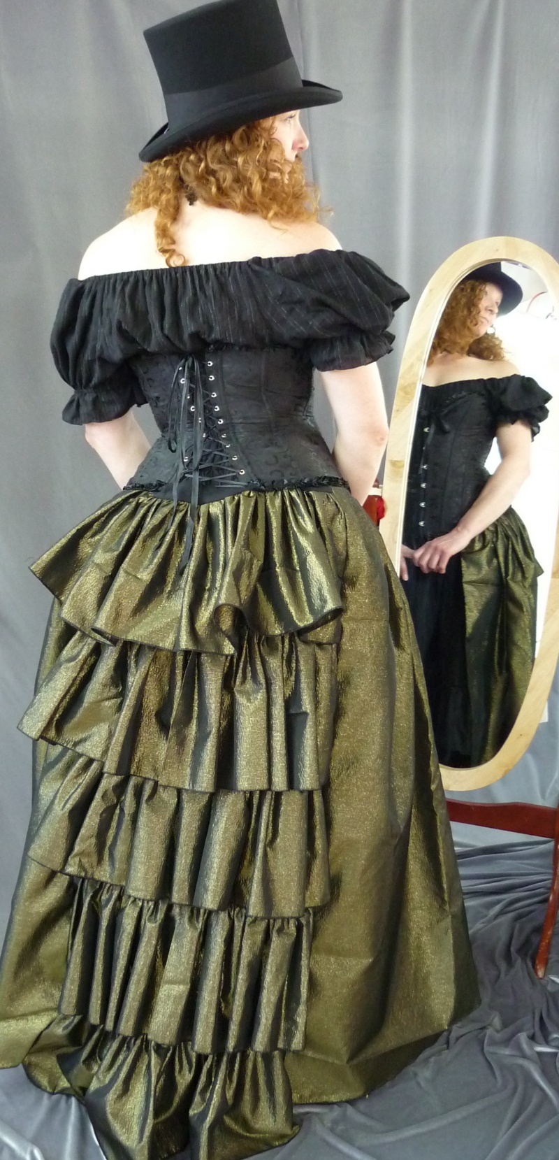 Female model photo shoot of Cloakmaker in Studio