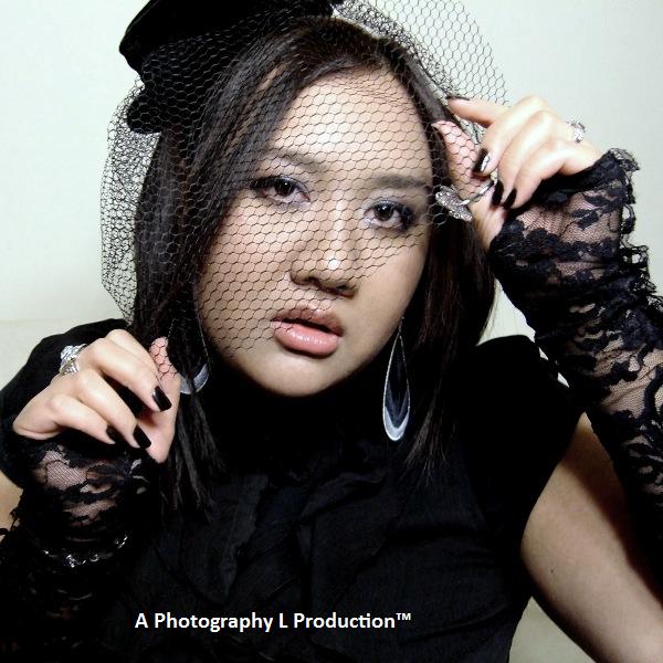 Female model photo shoot of Photography L
