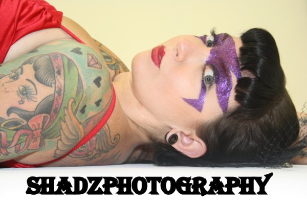 Female model photo shoot of FAKE IT Studio and Carly- Jade by Shadz Photography