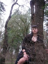 Female model photo shoot of BayouBettie in Masonic Cemetery Eugene, Or