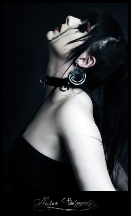 Female model photo shoot of redruM Raven by Noctem Photography in John's Studio