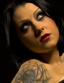 Female model photo shoot of Toxic Temptress in studio