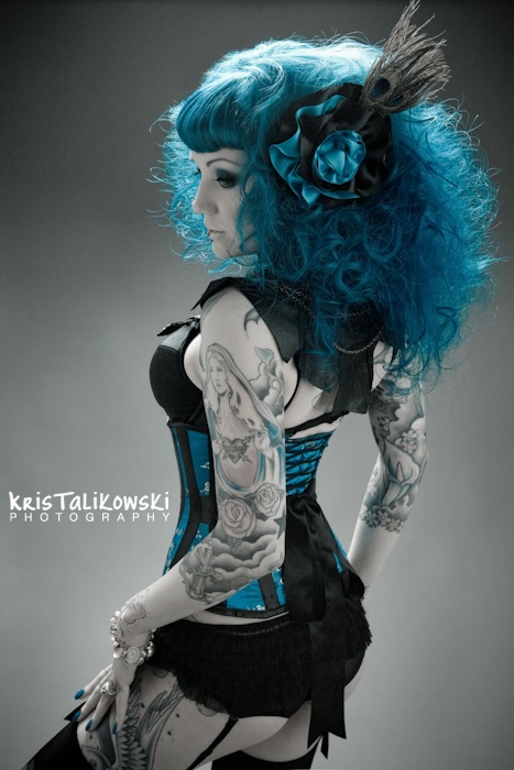 Female model photo shoot of valkyrie corsets