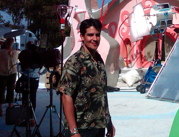 Male model photo shoot of Ian S Casas in On the job at Universal.