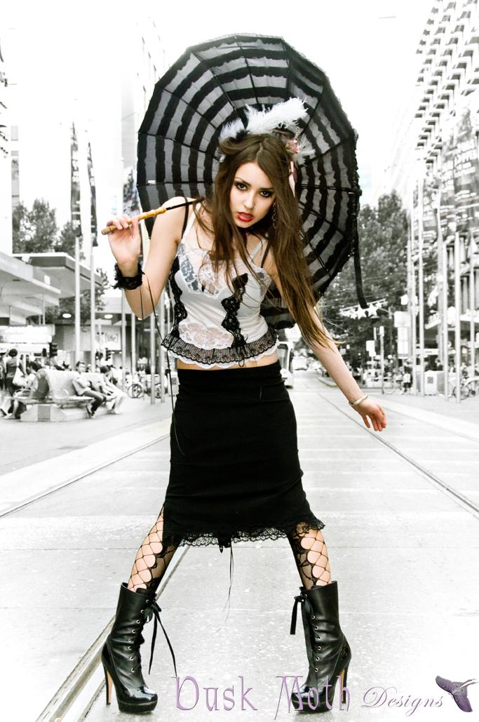 Female model photo shoot of Dusk Moth Designs and Tara McIvor by John E Photography in Burke St, Melbourne