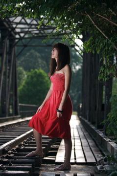 Female model photo shoot of Aletheajane in Old train tracks, Singapore