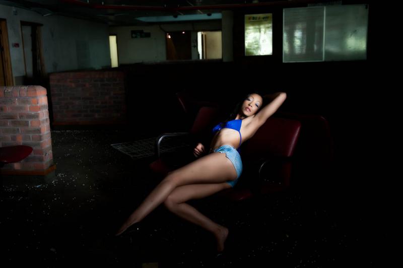 Female model photo shoot of Michaela Mendez by JonathanRyan in abandoned hospital