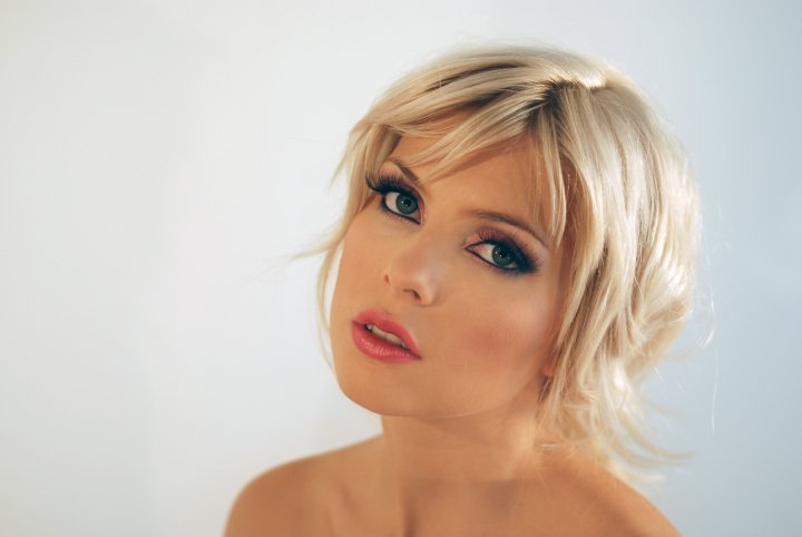 Female model photo shoot of Antoinette MakeupArtist