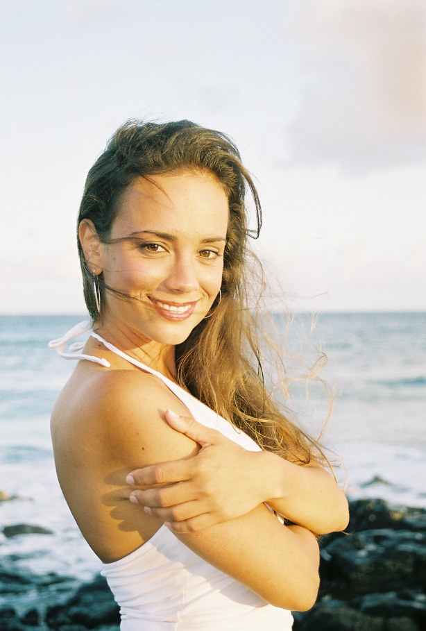 Female model photo shoot of Photography By DES  in Shipwrecks, Kauai