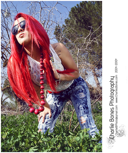 Female model photo shoot of redz reds