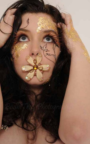 Female model photo shoot of Scarlett Adams makeup