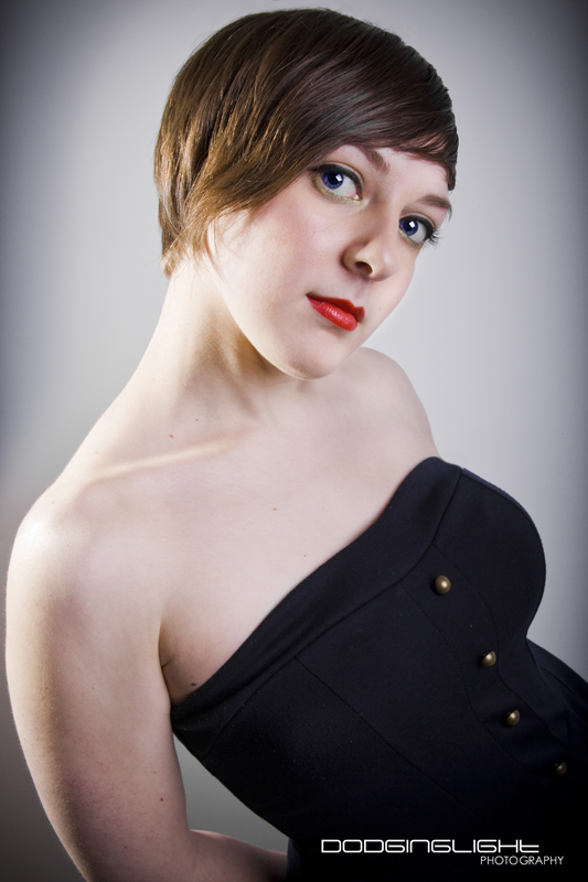 Female model photo shoot of Carley LoFaso by DODGINGLIGHTphotography in Home Studio, makeup by MK Lemon Photography