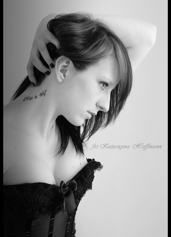 Female model photo shoot of black fairy cake