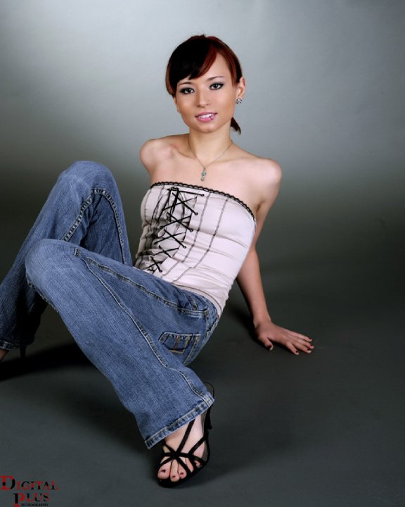 Female model photo shoot of Little Asian Angela in Digital Plus photography's studio