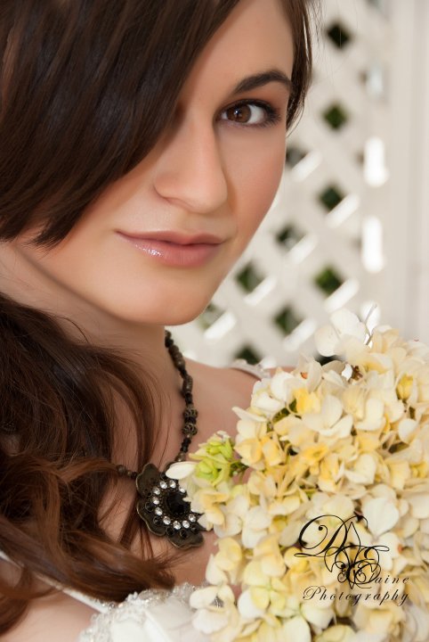 Female model photo shoot of Kris Kay in Folsom Bridal Show