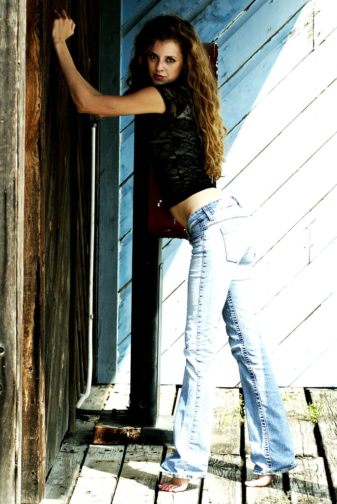Female model photo shoot of Nicole Renee Crocker in by a payphone outdoors