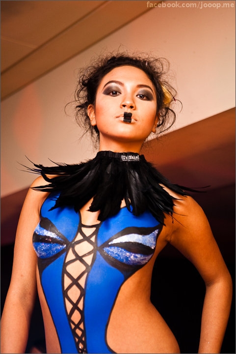 Female model photo shoot of Kanika C by Limuel Martine in Hotel Chambers, makeup by Jennifer Foo