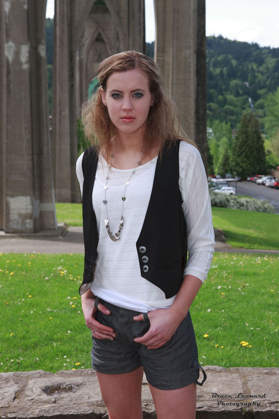 Female model photo shoot of Cano Apparel and AlanaR by Big-Bad Pixel Daddy in Cathedral Park under the St. John's Bridge, hair styled by Nichole Stewart, makeup by Nikki Schipper