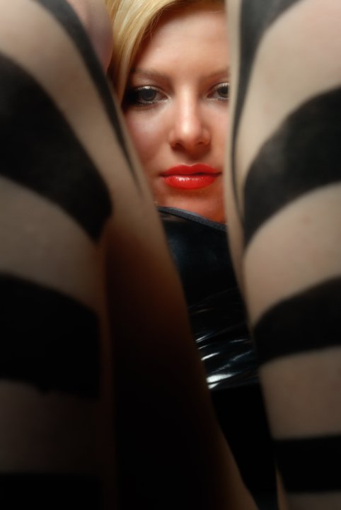 Female model photo shoot of Anastasiya P, body painted by Pintor