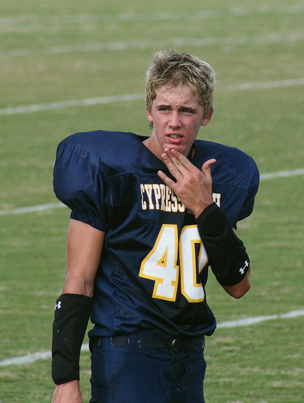 Male model photo shoot of Travis Coffman in cy-ranch football game