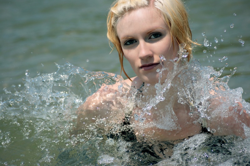 Female model photo shoot of Divinity Photography in Bradford Beach, Lake Michigan, Milwaukee