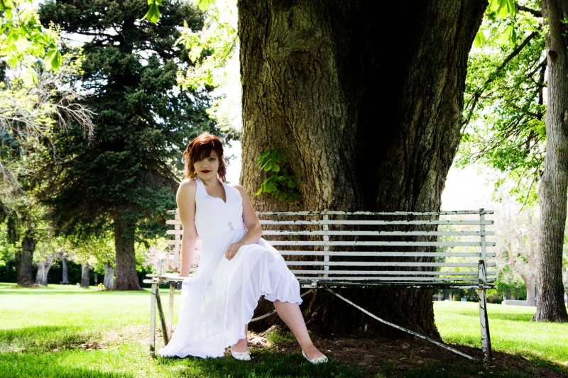 Female model photo shoot of Aubrilynn Braithwaite in Wasatch Lawn Cemetary