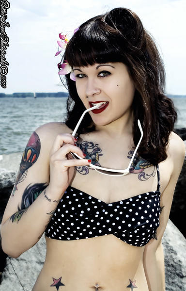 Female model photo shoot of Desiree Zombie by BitterSweet Photography in Yorktown Beach, Va