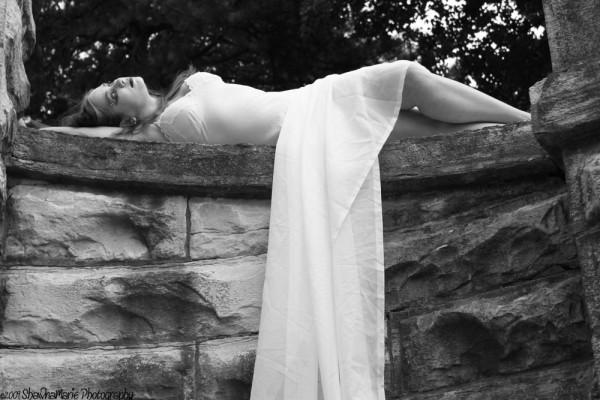 Female model photo shoot of FG Kristen in graveyard