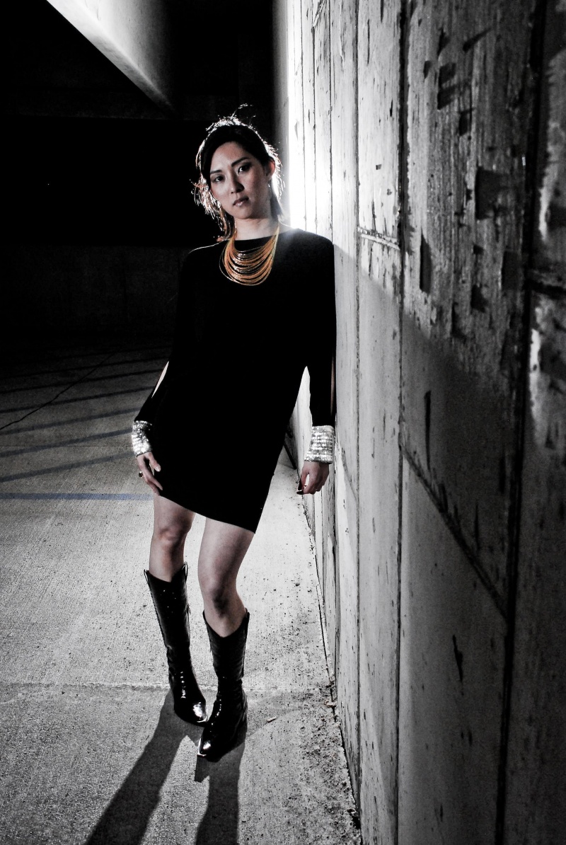 Female model photo shoot of Kris Zhuang in parking lot