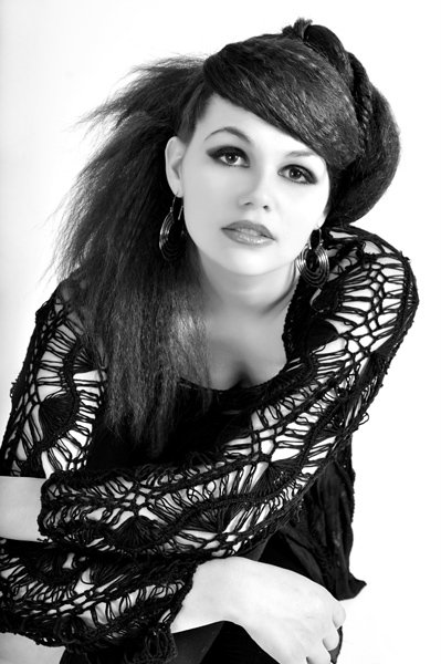 Female model photo shoot of Whisper Mac, hair styled by Beauty by V