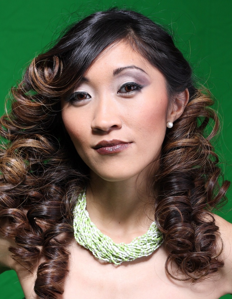 Female model photo shoot of lizabelle hair boutique