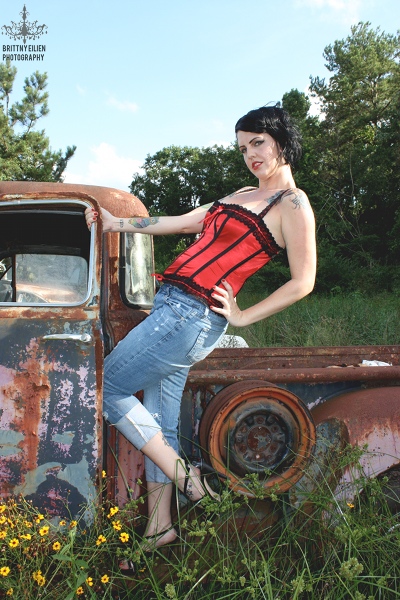 Female model photo shoot of Candy Girl Studios in Classic Car Consignment